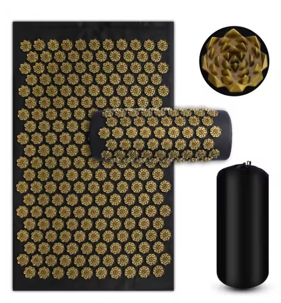 Troveze Acupressure Massage Mat + Pillow Set: gold spike mat laid flat with pillow and bolster
