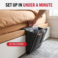 Troveze Bedside Storage Caddy: Hand sliding anchor flap under mattress