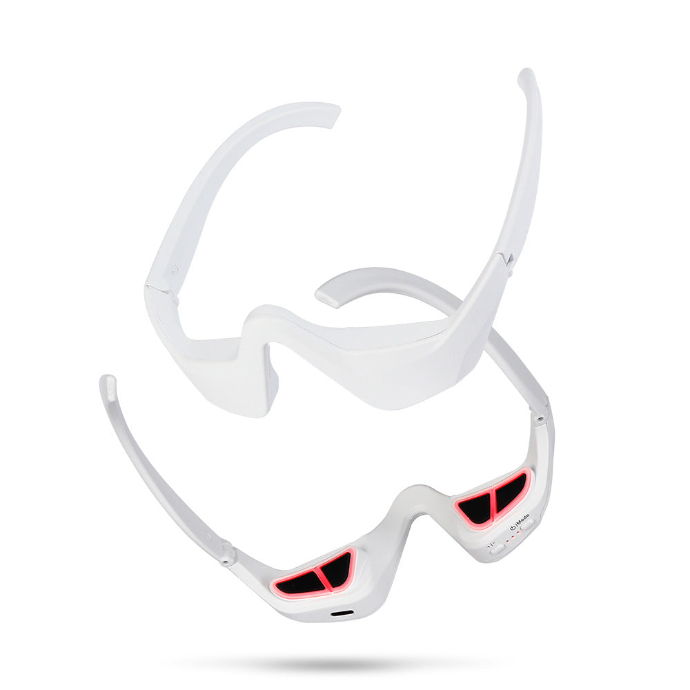 Troveze Heated Compression Eye Massager: front view with the warming panels lit inside